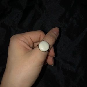 gold ring with large white marble stone